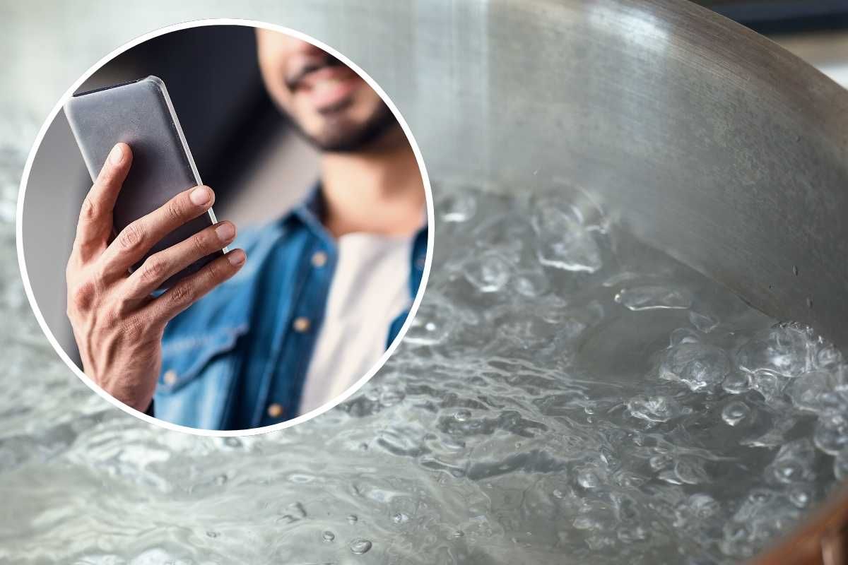 Acqua che bolle, uomo con cellulare